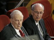 FILE - This July 10, 2015, file photo, shows Senior Mormon leader Robert D. Hales, right, and Richard G. Scott, left, attending the memorial service for Mormon leader Boyd K. Packer at the Tabernacle on Temple Square in Salt Lake City. Senior Mormon leader Robert D. Hales has died at the age of 85. Church spokesman Eric Hawkins said in a statement that Hales died Sunday, Oct. 1, 2017, in a Salt Lake City hospital surrounded by his wife and family.