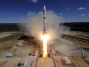 A Russian Soyuz 2.1a rocket carrying Lomonosov, Aist-2D and SamSat-218 satellites lifts off from the launch pad April 28, 2016, at the new Vostochny Cosmodrome outside the city of Uglegorsk, about 200 kilometers (125 miles) from the city of Blagoveshchensk in the far eastern Amur region, Russia. Six decades after Sputnik opened the space era, Russia has struggled to build up on its Soviet-era space achievements and space research now ranks very low among the Kremlin’s priorities.