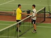 Andre Mertvyy (left) of Columbia River shakes hands with his brother, David Mertvyy of Hudson's Bay, after Andre beat David in a non-league match last Wednesday at Vancouver Tennis Center (Tim Martinez/The Columbian)