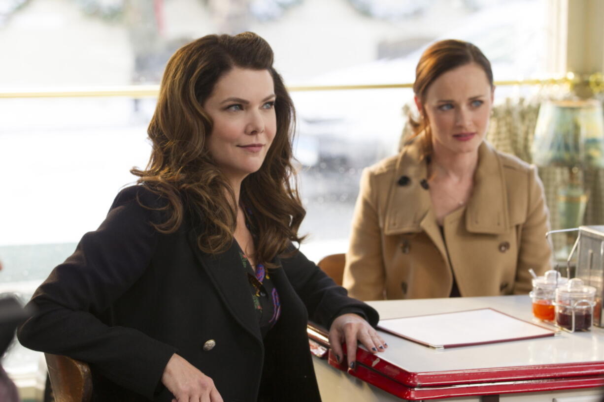 Lauren Graham, left, and Alexis Bledel in a scene from “Gilmore Girls: A Year in the Life.” The Netflix series currently holds the top spot for binge racing, Netflix says.