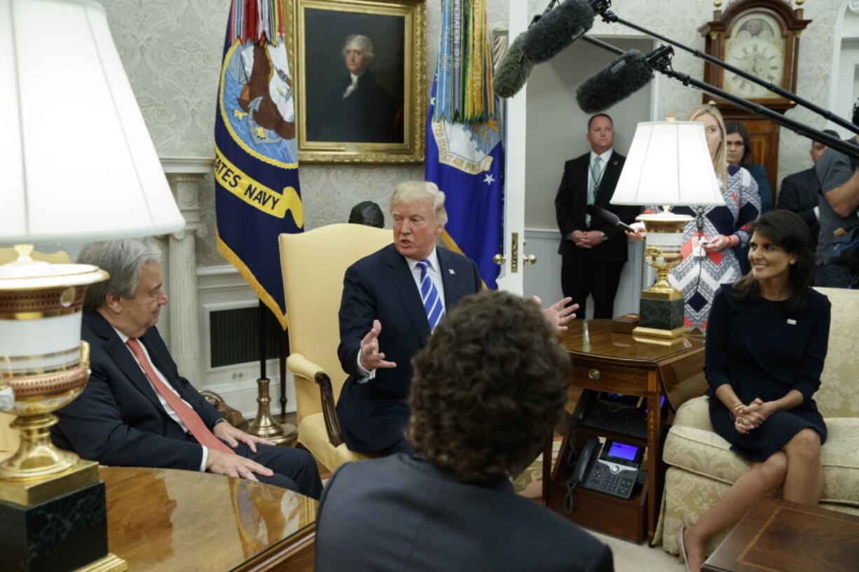 US Ambassador to the United Nations Nikki Haley looks on as President Donald Trump meets with United Nations Secretary General Antonio Guterres in the Oval Office of the White House, Friday, Oct. 20, 2017, in Washington.