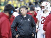 Washington State head coach Mike Leach works the sidelines against Oregon in an NCAA college football game Saturday, Oct. 7, 2017 in Eugene, Ore.