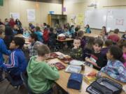 Third graders eat lunch in a crowded classroom at Pleasant Valley Primary in March.  The school is among those the Battle Ground Public Schools hopes to replace with a bond measure in April.