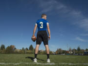 Mountain View High School quarterback Glen Perry Jr. on his team’s practice field Tuesday morning.