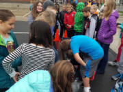 Ridgefield: Union Ridge Elementary School fourth-graders signing a steel beam, which will be placed in the new 5th through 8th grade campus, which is expected to open in time for the start of the 2018 school year. District officials came up with the idea earlier this year to get students involved with construction of the new campus.