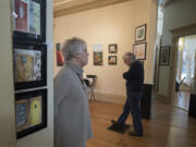 Painters and Mosaic Arts Alliance officers Joan Giddings Turley, left, and husband John Turley discuss the impending closure of Gallery 360 in Vancouver’s historic Slocum House. This gallery is unlike any other because of its location and its history, they said; it’s an ideal gateway to Vancouver for visitors. But do city officials realize that?