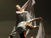 Vancouver School of Arts and Academics students Kate Campbell, top, and Madison Gebhard in rehearsal for “A Codex of Flight.” (Maria Vara)