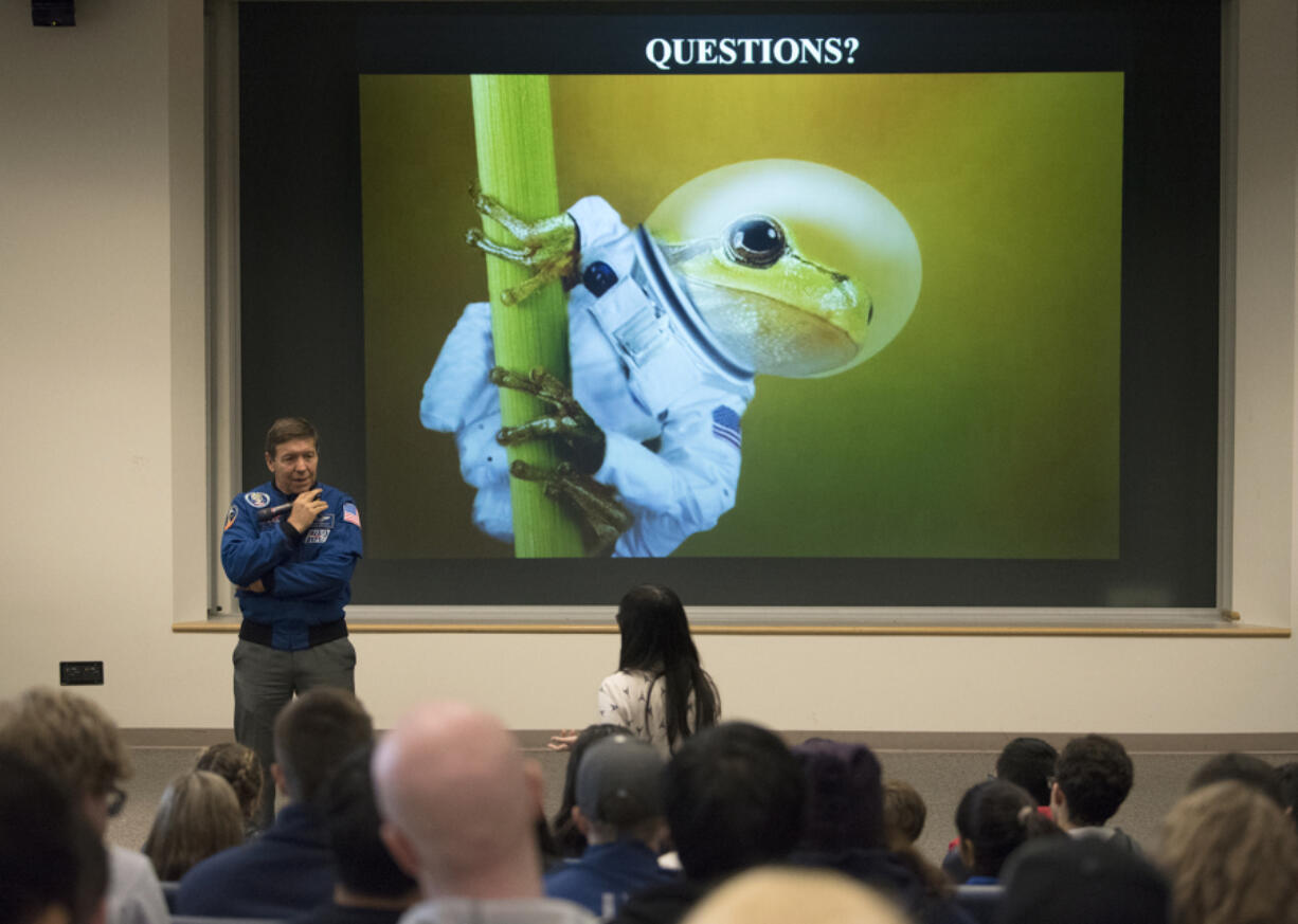 NASA astronaut Mike Barratt, a graduate of Camas High School, takes questions while speaking to an audience of about 200 high school students Thursday morning at Washington State University Vancouver.