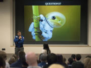 NASA astronaut Mike Barratt, a graduate of Camas High School, takes questions while speaking to an audience of about 200 high school students Thursday morning at Washington State University Vancouver.