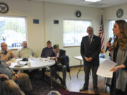 U.S. Rep. Phil Roe, R-Tenn., right of center, and Rep. Jaime Herrera Beutler speak with veterans about VA wait times.