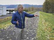 David Ripp, executive director of the Port of Camas-Washougal, points to some of the problems inspectors have identified with the levee the port maintains.