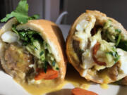 The egg adds a richness to an already-tasty grilled pork bahn mi at Bahn Mi Saigon, where you can try some delicious Vietnamese food.