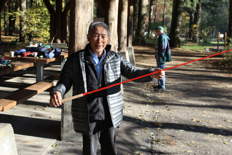 Kuni Masuda, a director with the Clark-Skamania Flyfishers, displays a tenkara fly rod. The ancient Japanese technique uses no reel and is designed for fishing small streams. the rod collapses into a very small package, making it a great choice for backpacking or traveling.