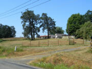 This property along a road outside of Washougal still has buildings from its past agricultural use. But a conservation group worried that McMansions would be added.