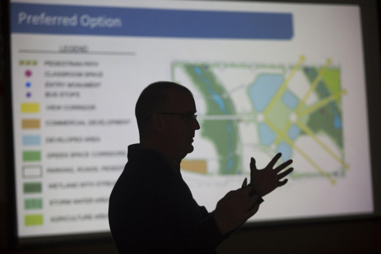 Designer Bryan Cole talks about plans for Clark College’s new north county location at Boschma Farms during a presentation in December in Ridgefield.