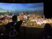 Fans get a preview of Stars Wars: Galaxy’s Edge, a new area under construction at Disneyland. The model was shown at the D23 Expo in July.