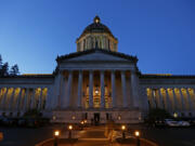 The Legislative Building in Olympia is shown at dusk in March 2016. (AP Photo/Ted S.