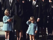 John F. Kennedy Jr., 3, salutes his father’s casket Nov. 25, 1963 in Washington, three days after the president was assassinated in Dallas. Widow Jacqueline Kennedy, center, and daughter Caroline Kennedy are accompanied by the late president’s brothers Sen. Edward Kennedy, left, and Attorney General Robert Kennedy.