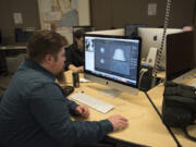 Ryan Schafte works on a 3-D model of the Providence Academy bell at Washington State University Vancouver in October. The students in Dene Grigar’s digital technology and culture program have partnered with The Historic Trust on new ways to tell the story of Mother Joseph and the Sisters of Providence.