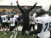 Hockinson assistant football coach Hayden Pinkle celebrates the Hawks’ 53-30 victory over West Valley.