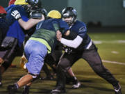 Hockinson’s offensive tackle Ryan Sleasman, right, has been part of every postseason run in the past three seasons with the Hawks.