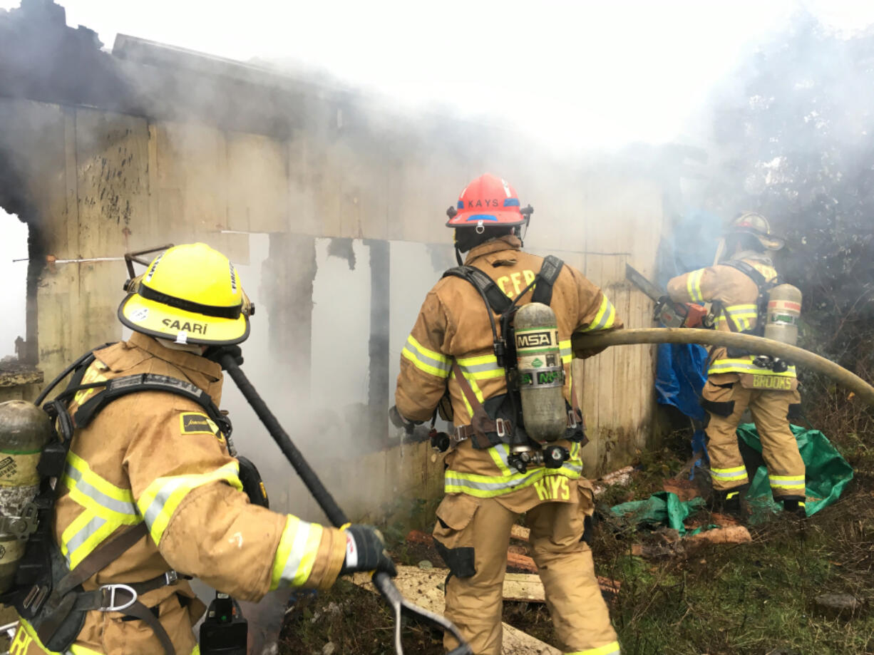 Firefighters prevented a shed fire from damaging nearby mobile homes Wednesday in Woodland.