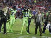 Seattle Seahawks cornerback Richard Sherman (25) leaves the game after an injury during the second half of an NFL football game, Thursday, Nov. 9, 2017, in Glendale, Ariz. Sherman did not return to the game after the injury.