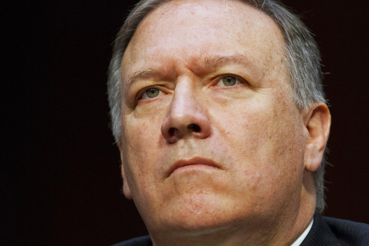 FILE - In the May 11, 2017 file photo, CIA Director Mike Pompeo listens while testifying on Capitol Hill in Washington. The White House is discussing a plan to replace Secretary of State Rex Tillerson with Pompeo, according to two administration officials.