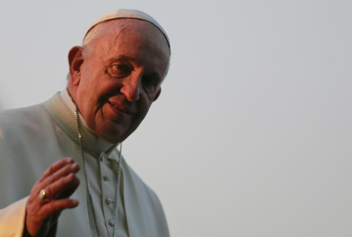 Pope Francis gestures as he visits the National Martyrs’ Memorial of Bangladesh in Savar, outskirts of Dhaka, Bangladesh, on Thursday. Pope Francis arrived in Bangladesh Thursday for the second leg of his six-day trip to Asia. (AP Photo/A. M.