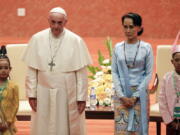 Pope Francis meets Myanmar’s leader Aung San Suu Kyi at the International Convention Centre of Naypyitaw, Myanmar, on Tuesday. The pontiff is in Myanmar for the first stage of a week-long visit that will also take him to neighboring Bangladesh.