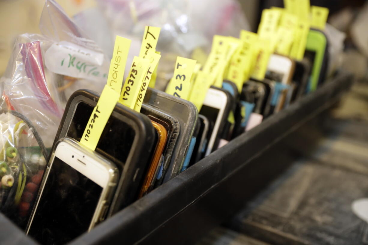 Lost and found items, including cell phones, are seen at Burning Man festival headquarters in San Francisco. The usual suspects top this year’s list of the most frequently lost items in the Nevada desert at the annual Burning Man festival: 582 cellphones, 570 backpacks and 529 IDs.