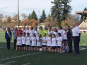 The Camas girls soccer team poses with the third-place trophy they won on Saturday, Nov. 18, 2017, after a 2-1 victory over Kennedy Catholic at the WIAA state tournament.