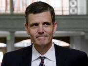 Washington State Auditor Troy Kelley walks into the federal courthouse June 12, 2015 for a hearing on tax evasion charges in Tacoma. Kelley, whose federal fraud trial last year ended with an acquittal on one count and a deadlocked jury on more than a dozen others, will be in a courtroom once again this week as prosecutors try him a second time. And this time, newly recovered emails dating to 2003 could shed light on whether he was entitled to pocket the roughly $3 million the government says he stole when he ran a real-estate services business during the height of last decade’s housing boom.