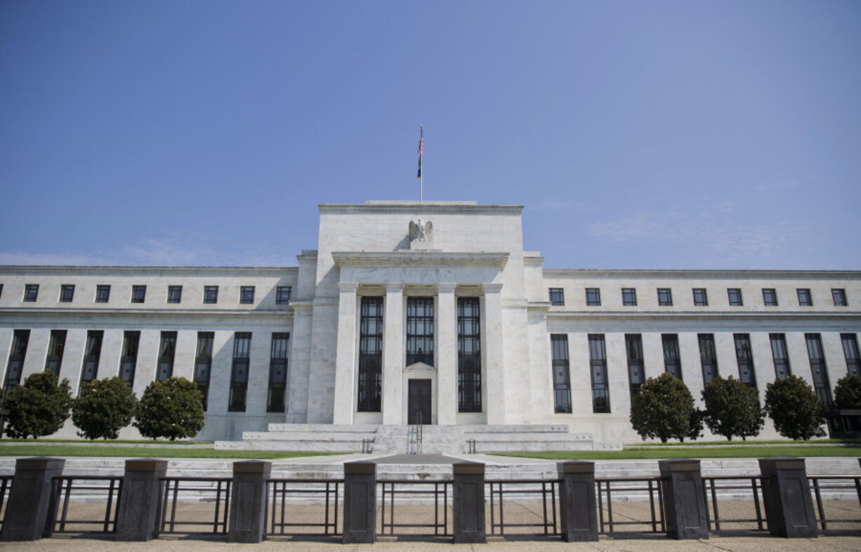 This Wednesday, Aug. 2, 2017, photo shows the Federal Reserve Building on Constitution Avenue in Washington. The Federal Reserve has begun the slow process of paring back its $4.5 trillion bond portfolio, and the stock market’s reaction has been barely a yawn. A lot is riding on whether markets can continue to remain calm.