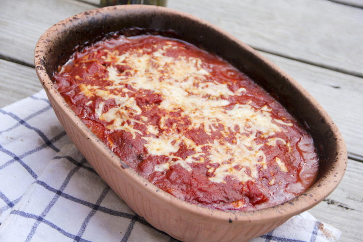 Layered eggplant and spinach Parmesan (Melissa d’Arabian via AP)