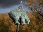 A sculpture with polar bear on a spear by Danish artist Jens Galschiot is pictured outside the 23rd UN Conference of the Parties climate talks in Bonn, Germany, on Friday.