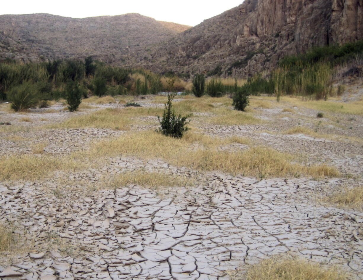 Dry cracked mud along the banks of the Rio Grande at Big Bend National Park in Texas during one of the strongest La Nina years on record. The National Oceanic and Atmospheric Administration said Thursday, Nov. 9, 2017 that a weak La Nina has formed and is expected to stick around for several months.