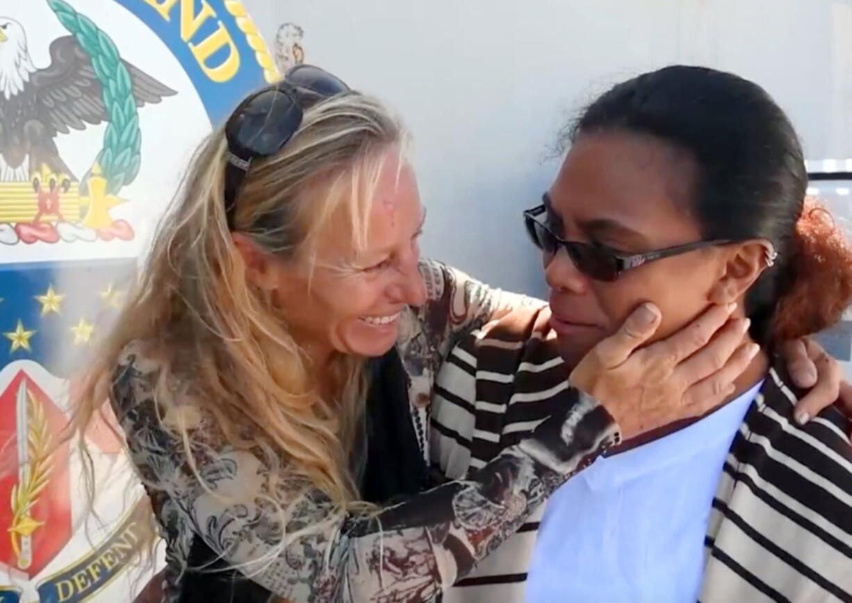 Jennifer Appel, left, and Tasha Fuiava, who with their dogs were rescued after being lost at sea for several months while trying to sail from Hawaii to Tahiti, are interviewed aboard the USS Ashland in the South Pacific Ocean. The U.S. Navy rescued the women on Wednesday after a Taiwanese fishing vessel spotted them about 900 miles southeast of Japan on Tuesday and alerted the U.S. Coast Guard. The women lost their engine in bad weather in late May, but believed they could still reach Tahiti. (Mass Communication Specialist 3rd Class Jonathan Clay/U.S.