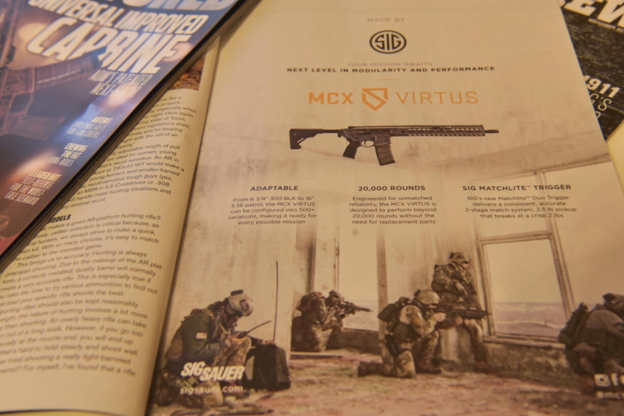 A magazine advertisement for an AR-style firearm describes the ability to customize the firearm and shows soldiers in combat. AR-platform firearms are often marketed using words that emphasizes the firearm’s ability to be customized and evoke a sense of patriotism, freedom and military strength.