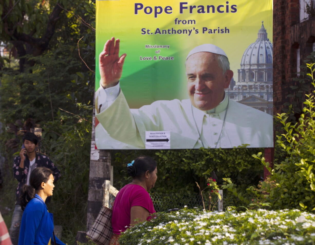 Ethnic Kachin Christians arrive at St. Anthony Catholic Church in Yangon, Myanmar. Pope Francis on Monday, Nov. 27, 2017 begins a six-day trip to the two countries. While attention will focus on how Francis addresses the Rohingya Muslim crisis, the trip also holds huge significance for the tiny Catholic communities in each country.