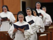 Sisters sing at the Dominican Sisters of Mary, Mother of the Eucharist campus in Ann Arbor, Mich.