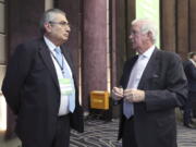 World Anti-Doping Agency President Craig Reedie, right, talks with IOC Vice President Ugur Erdener before the start of the WADA’s foundation board meeting in Seoul, South Korea, on Thursday. The WADA holds its executive committee and foundation board meeting for three days in the country which will host the 2018 Olympic and Paralympic Winter Games held in February 2018.