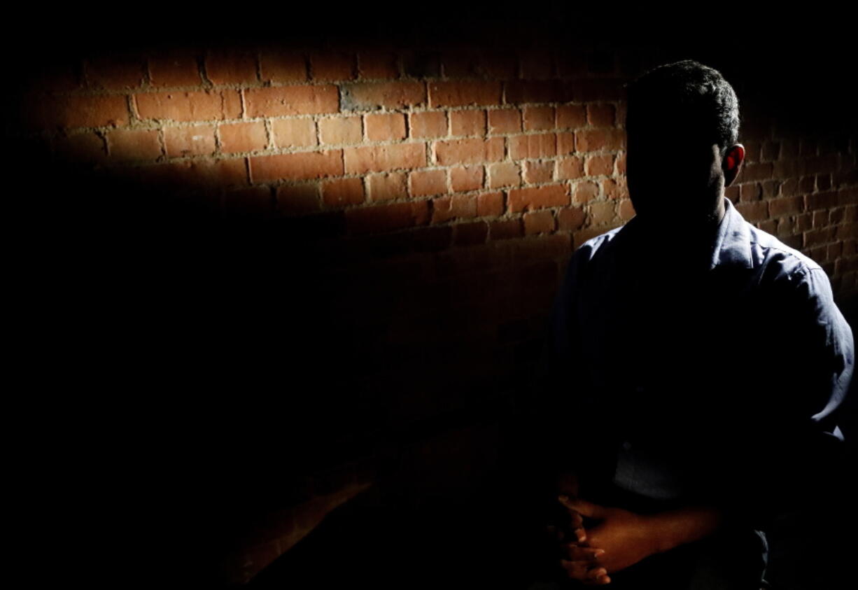 A Sri Lankan man known as Witness #249 speaks during an interview in London. He admits to having been a member of the Tamil Tigers rebel group nearly a decade ago, joining up when their ranks had been depleted in the final stages of the war. Soon after his wedding in 2016, he said, he was snatched off the streets, arriving at a torture room hours later.