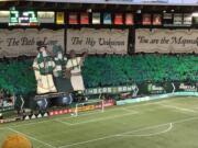 The Timbers Army fan section raises a Lewis & Clark-theme tifo prior to the MLS playoff match against Houston on Sunday, Nov. 5, 2017, at Providence Park. Houston won the match 2-1 to advance to the Western Conference final.