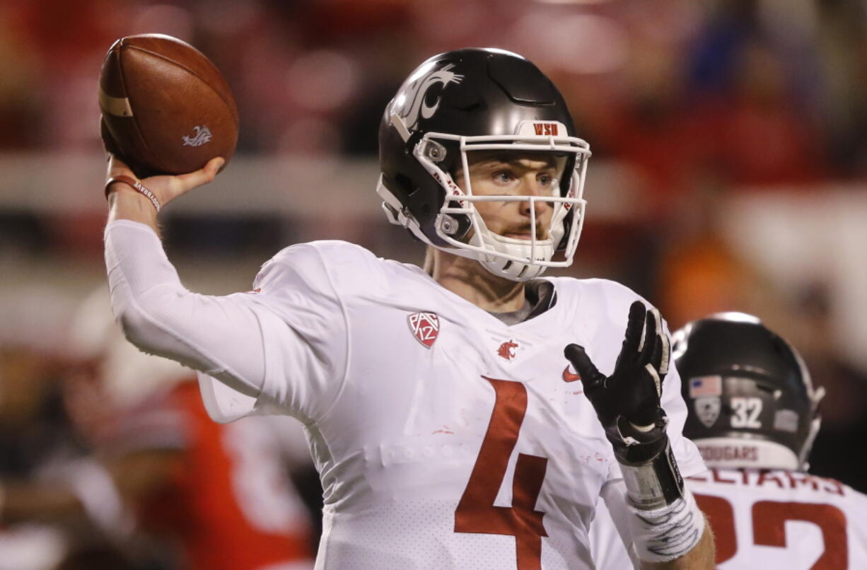 Washington State quarterback Luke Falk (4) passes the ball against Utah in the second half of an NCAA college football game Saturday, Nov. 11, 2017, in Salt Lake City.