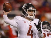 Washington State quarterback Luke Falk (4) passes the ball against Utah in the second half of an NCAA college football game Saturday, Nov. 11, 2017, in Salt Lake City.