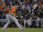 Houston Astros’ Charlie Morton reacts after Game 7 of baseball’s World Series against the Los Angeles Dodgers Wednesday, Nov. 1, 2017, in Los Angeles. The Astros won 5-1 to win the series 4-3.