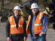 Kevin Tapani, left, and Leigh Tapani are pictured at the construction site for the Columbia Palisades in southeast Vancouver. The brothers are two of six family owners of Tapani Inc., which is coming off a record year for revenue in 2017.