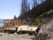 Clark County: Volunteers from Salmon Creek United Methodist Church and Mill Plain United Methodist Church rebuild a house overlooking Lake Chelan that was destroyed in a fire a few years ago.