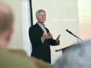 Jesse Berst, chair and founder of the Smart Cities Council, speaks Wednesday to an audience at the Smart Cities Workshop hosted by Regional Transportation Council at Fisher’s Landing Transit Center.